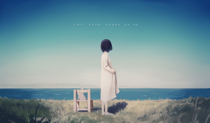 Girl with black hair and a teddy bear by the sea