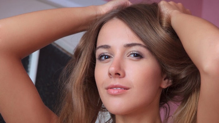 Lina Diamond with blonde hair and brown eyes