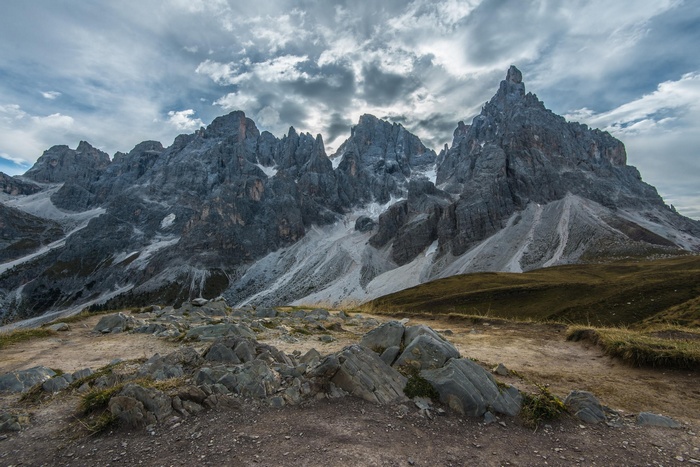 Jagged mountain range under a cloudy sky