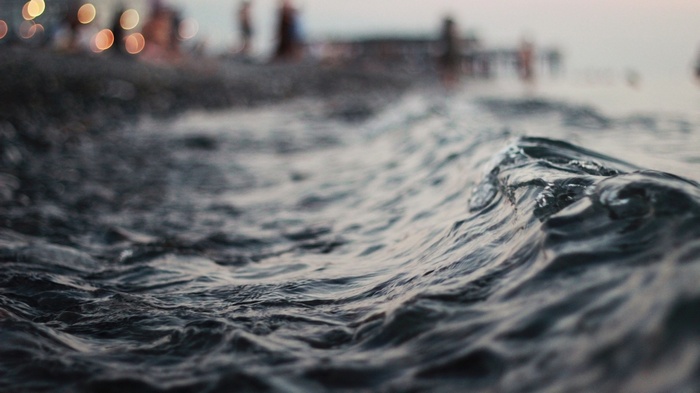 Water waves at the North Sea during evening