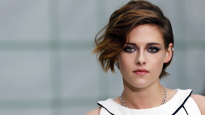 Kristen Stewart with smoky eye makeup and short hair