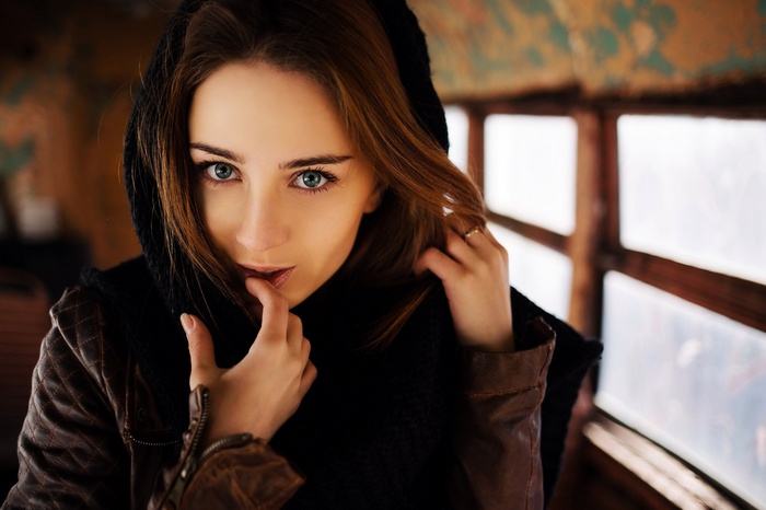 Portrait of Anna Kotova with finger on lips