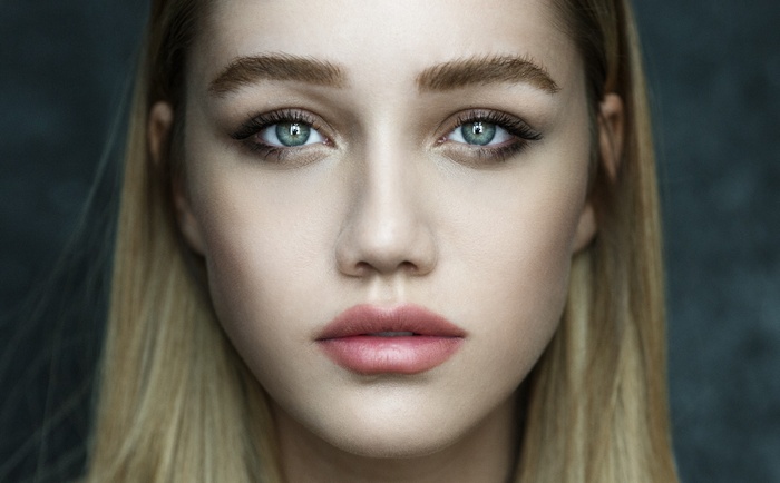 Portrait of a blonde woman with blue eyes