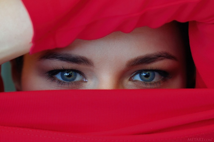 Ardelia A with blue eyes and red fabric