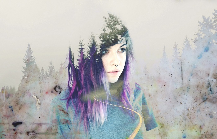 Woman with purple hair and double exposure forest