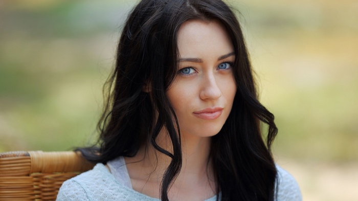 Zsanett Tormay with dark hair and blue eyes