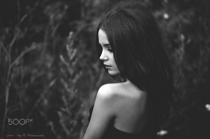 Monochrome portrait of Ksenia Kokoreva with bare shoulders
