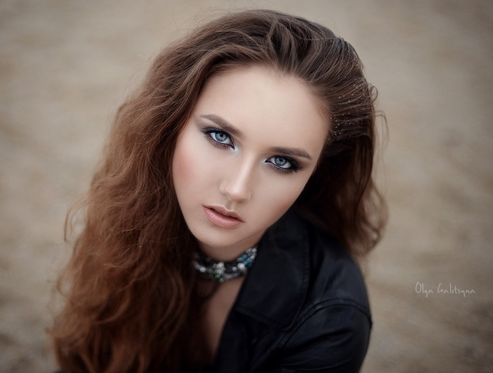Olga Galitsyna portrait with blue eyes and long hair