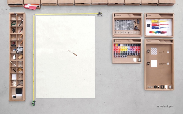 Digital art tools and supplies arranged on a wall