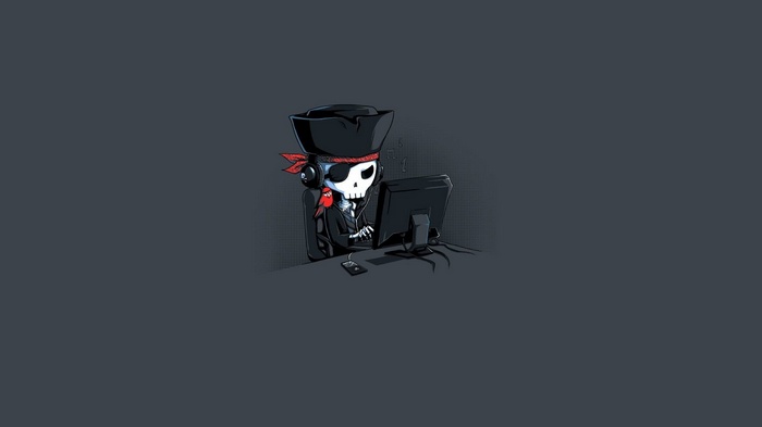 Skeleton pirate at computer