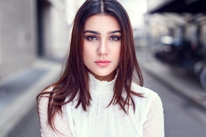 Portrait of a young woman with dark hair