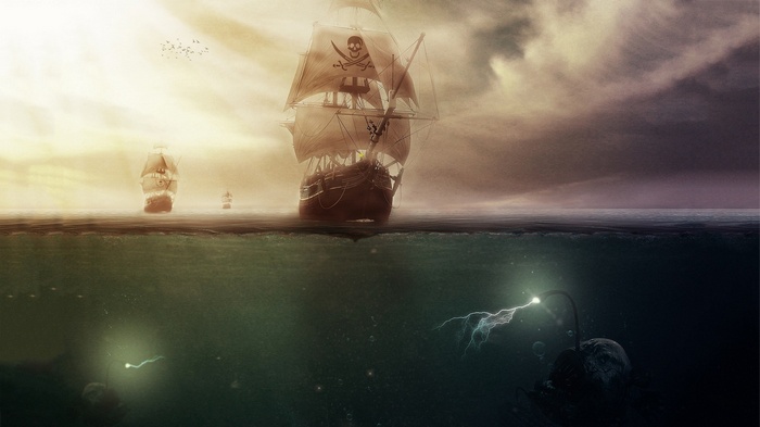 Pirate ships sailing on the sea with underwater creatures