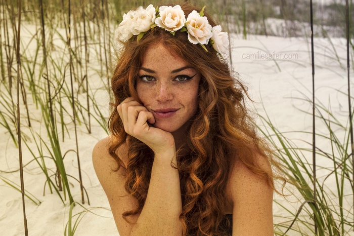 Sydney La Faire with flower crown on beach