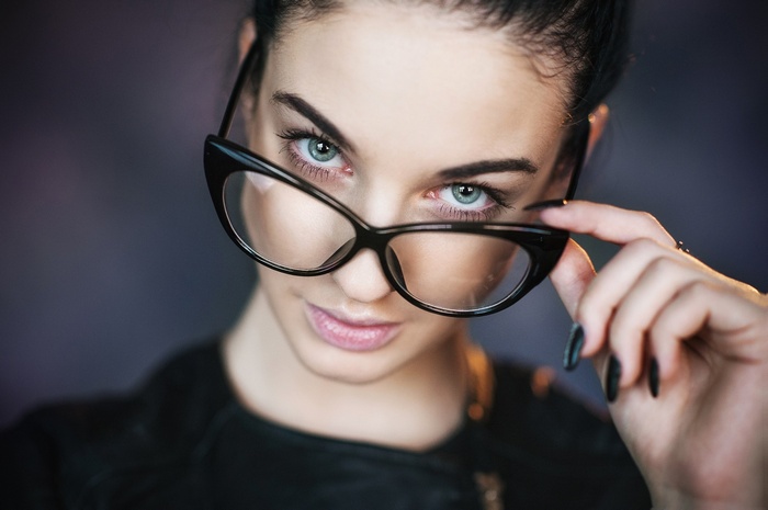 Alla Berger wearing cat-eye glasses