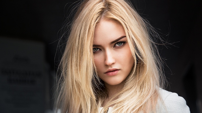 Portrait of a blonde woman with blue eyes