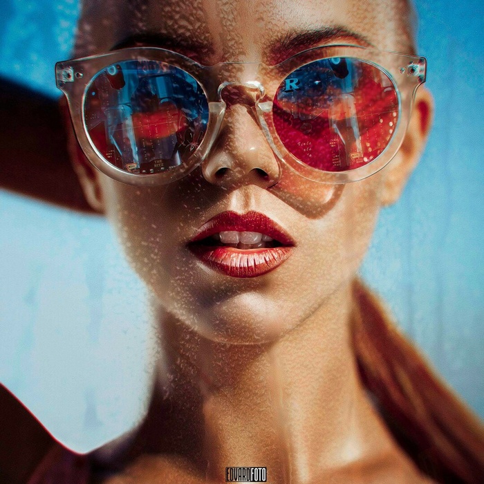 Woman wearing sunglasses with reflections
