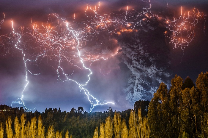 Lightning strikes over a volcanic eruption in Chile