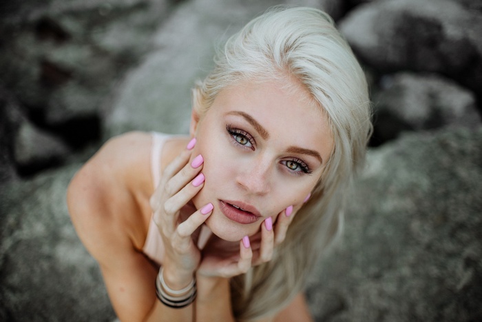Natalie Ganzhorn portrait with blonde hair and painted nails