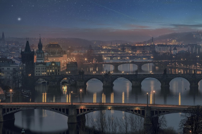 Charles Bridge over Vltava River in Prague at Night