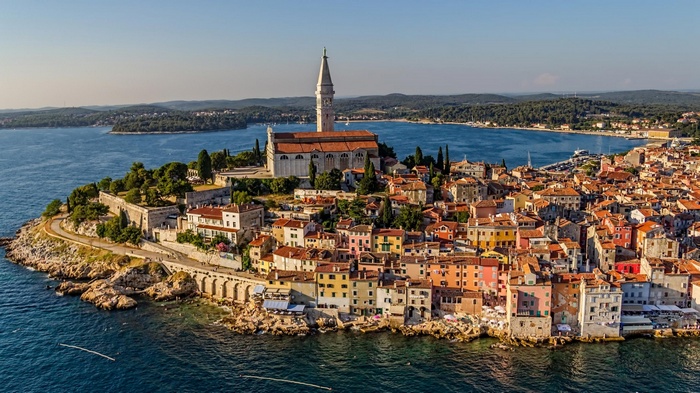 Rovinj cityscape with church tower and sea