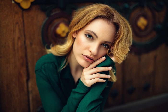 Portrait of a blonde woman with green eyes