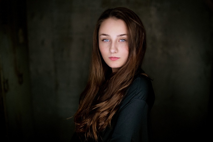 Portrait of a young woman with blue eyes