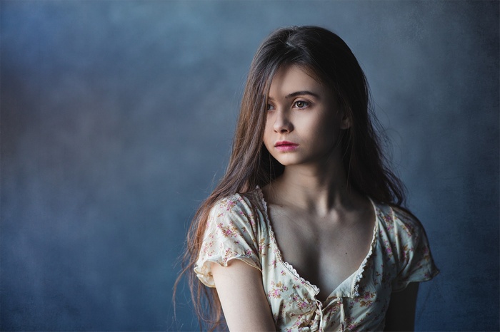 Portrait of a young woman with long hair by Ivan Proskurin