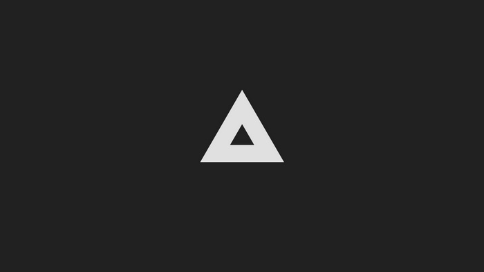 Minimalist abstract triangle on a dark background