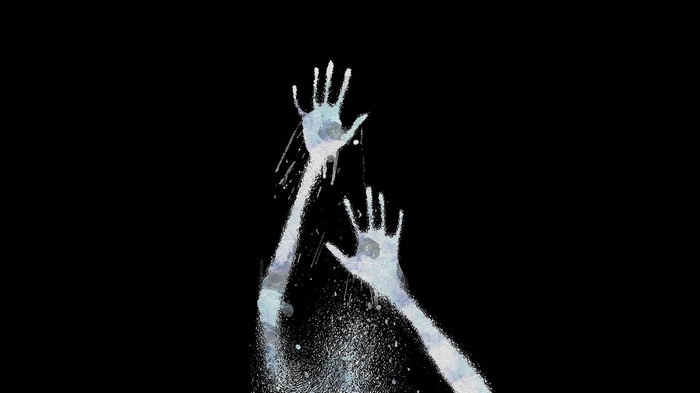 Gallows Hill blurred hands on black background