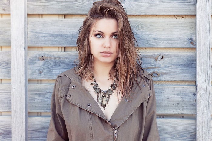 Portrait of a young woman with blue eyes