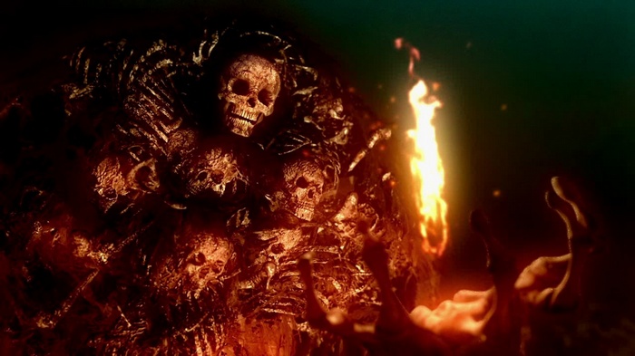 Nito from Dark Souls surrounded by skulls and fire