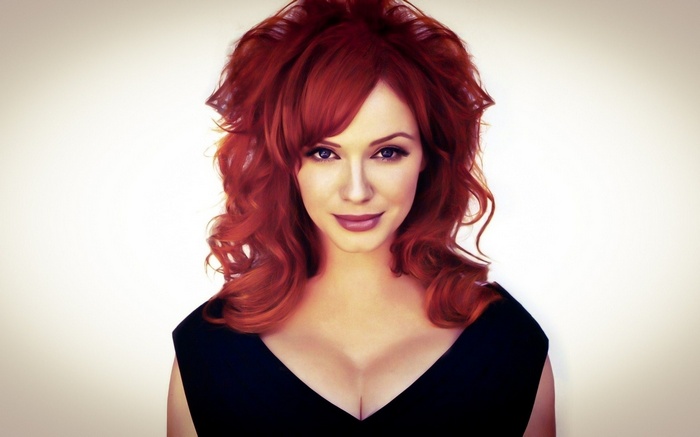 Christina Hendricks with red hair and red lipstick