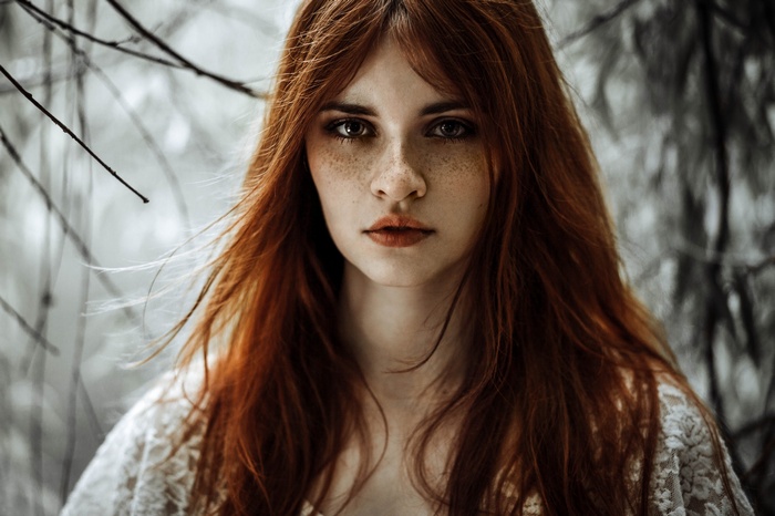 Redhead woman with freckles portrait