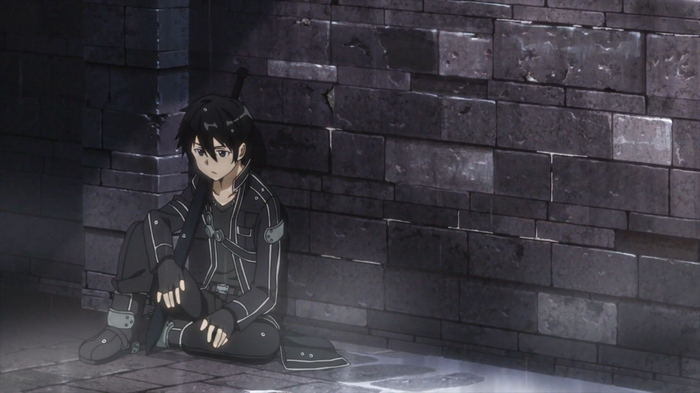 Kirigaya Kazuto sitting by a brick wall