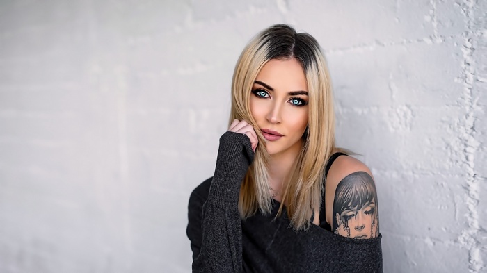 Stephanie LeBlanc with blonde hair and blue eyes
