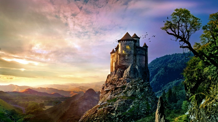 Castle on a rocky mountain at sunset with birds flying