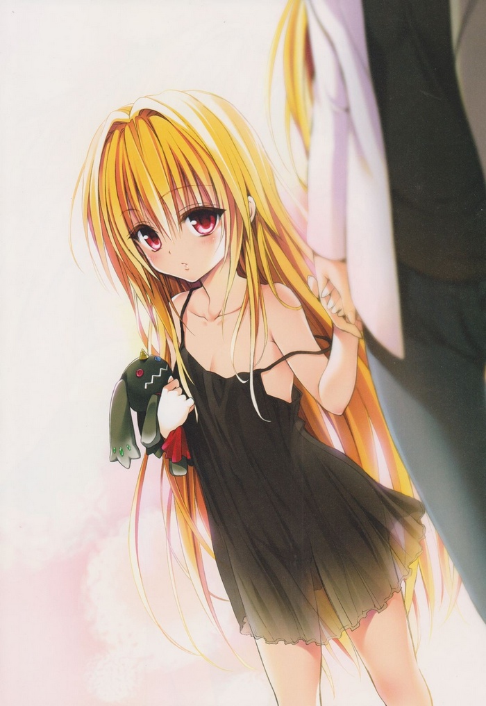 Golden Darkness holding a stuffed toy