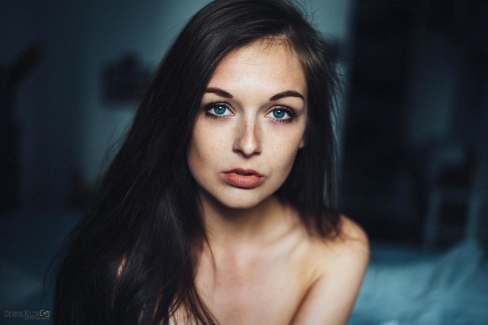 Portrait of a young woman with blue eyes
