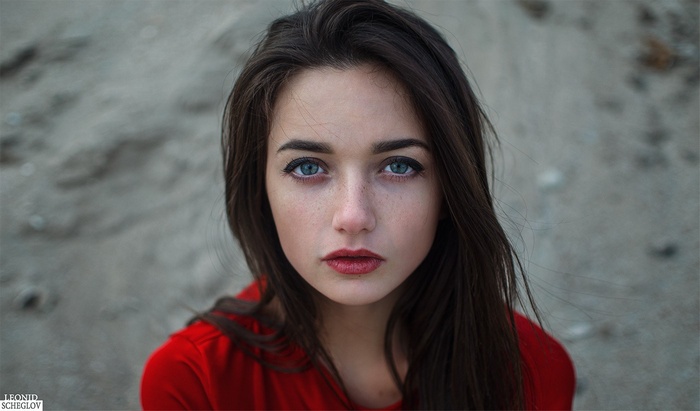 Portrait of a young woman with blue eyes