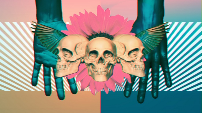 Three winged skulls and a flower