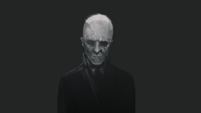 Bald man with scars and white skin wearing a suit