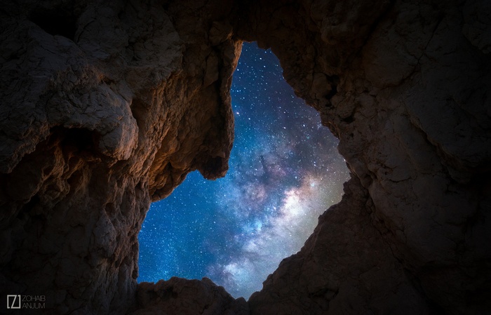 Milky Way seen through a cave opening