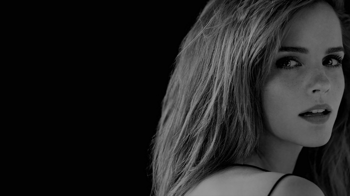 Emma Watson looking over her shoulder in monochrome
