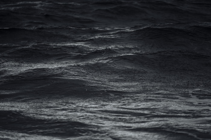 Dark monochrome waves on the sea