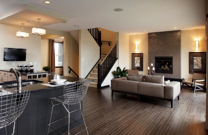 Modern open-plan living room and kitchen with fireplace