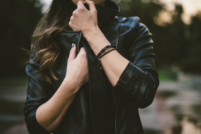 Woman in a black leather jacket