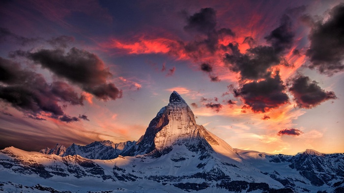 Matterhorn mountain at sunset with dramatic clouds