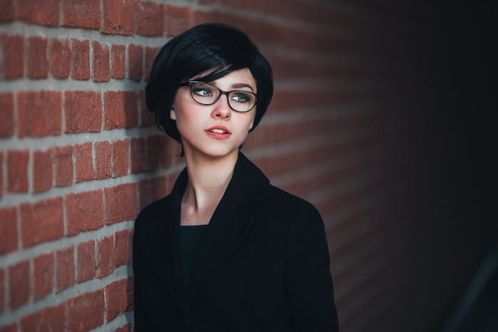 Alice Tarasenko with glasses and short black hair