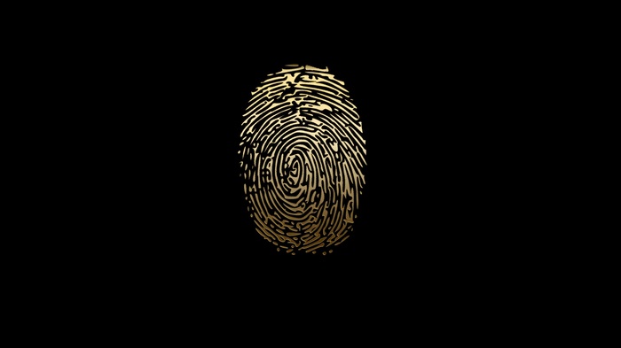 Golden fingerprint on a black background