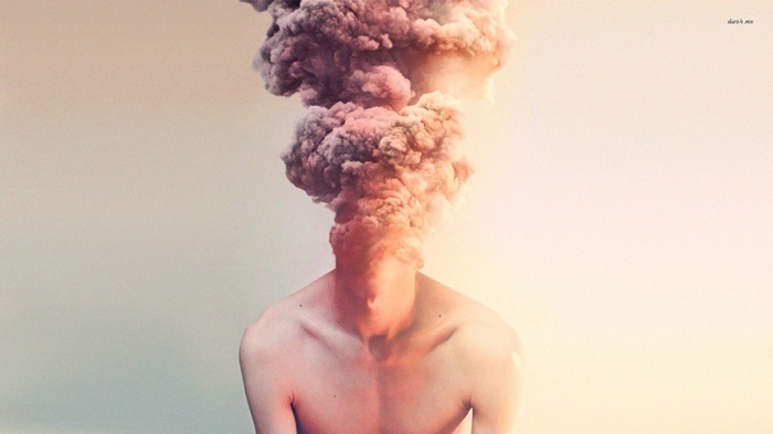 Man with explosion of smoke from head